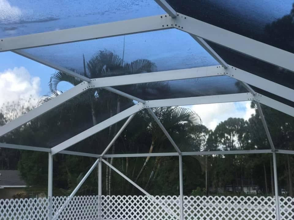 Sparkle & Shine pressure washing crew working on a Palm Beach County home
